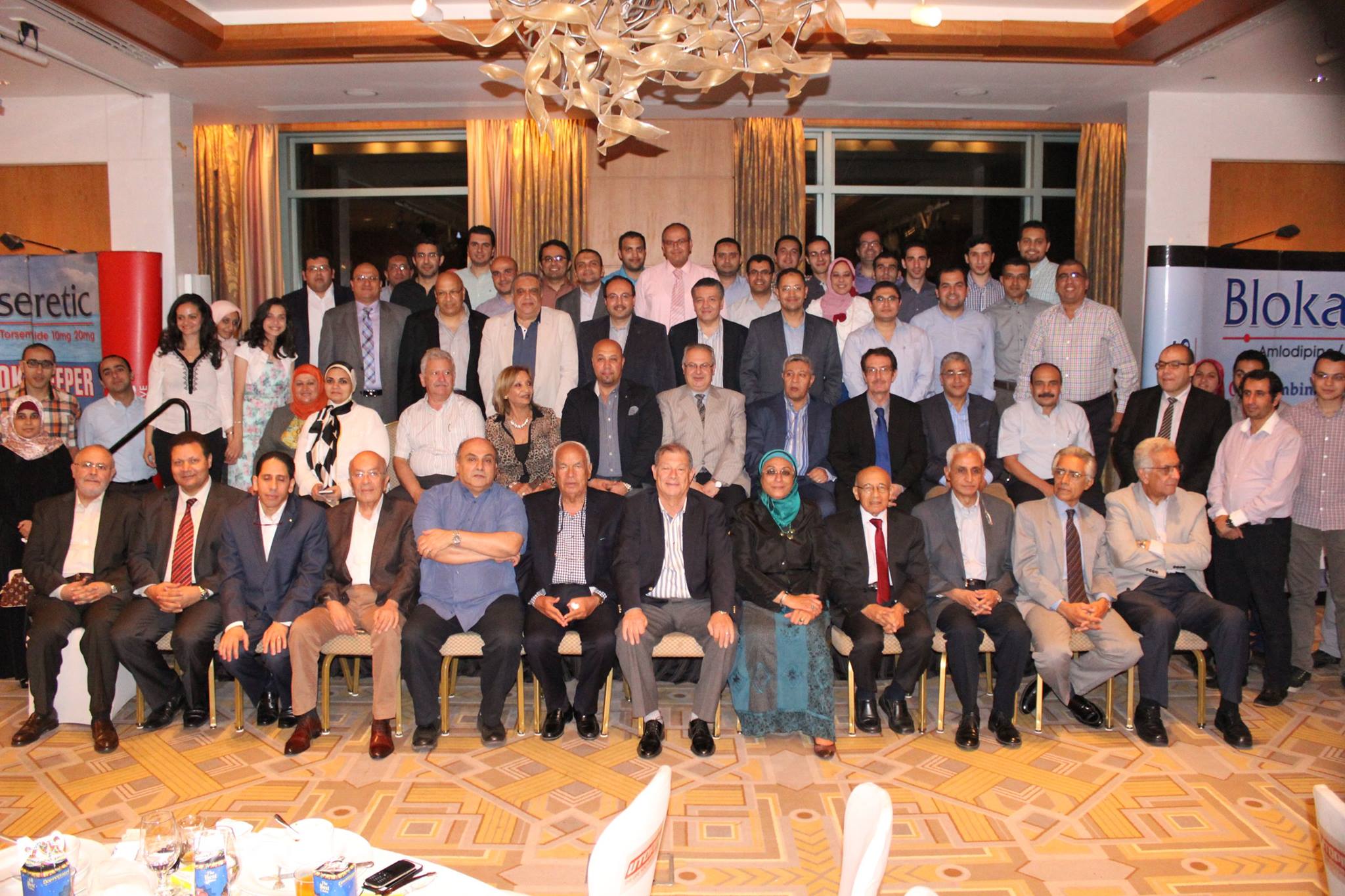 Group photo with cardiology colleagues and fellows at an Egyptian conference