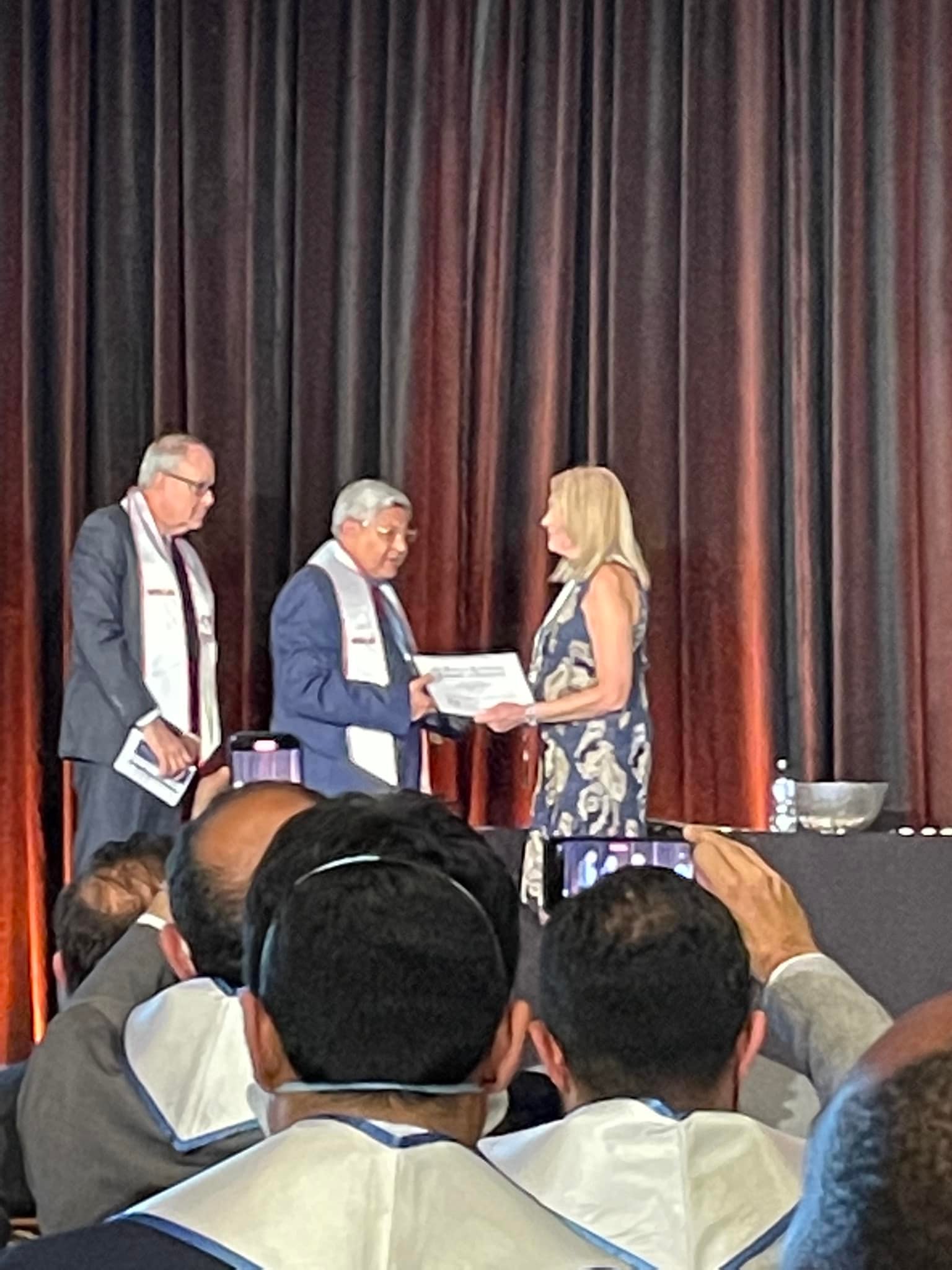 Receiving the Master of SCAI distinction on stage